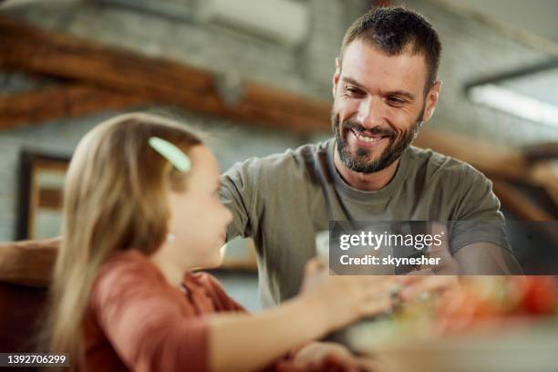 happy single father and daughter toasting at home. - milk family stock pictures, royalty-free photos & images