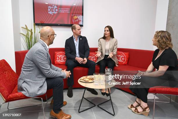 Prince William, Duke of Cambridge and Catherine, Duchess of Cambridge speak to Saleh Saeed , CEO of DEC, and Hannah Richards , Director of...