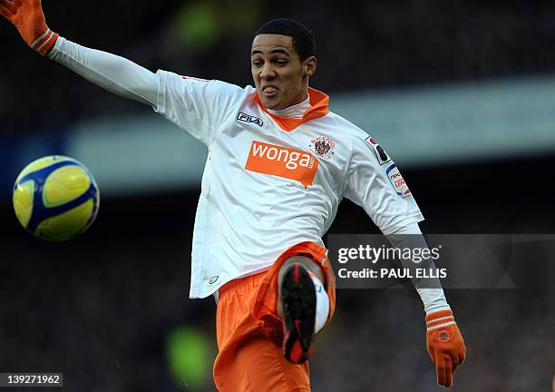 Blackpool's English midfielder Thomas Ince controls the ball during the English FA Cup 5th Round football match between Everton and Blackpool at...