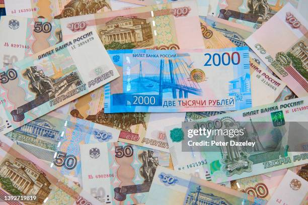 Photograph shows Russian ruble or rouble on April 20, 2022 in London, England. The Ruble is the official currency of the Russian Federation and it is...