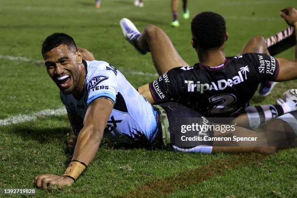 Ronaldo Mulitalo of the Sharks celebrates after scoring a tryduring the round seven NRL match between the Cronulla Sharks and the Manly Sea Eagles at...