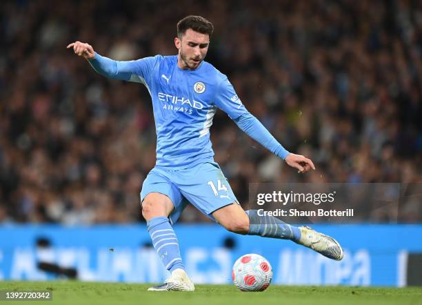 Aymeric Laporte of Manchester City crosses the ball during the Premier League match between Manchester City and Brighton & Hove Albion at Etihad...