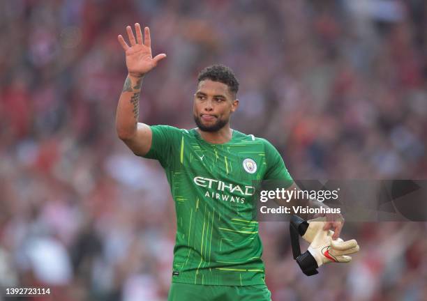 Zack Steffen of Manchester City acknowledges the City fans after The Emirates FA Cup Semi-Final match between Manchester City and Liverpool at...