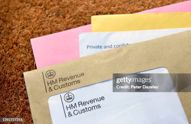 Photograph shows HMRC envelope, Her Majestys Revenue and Customs reminding of the date that self-assessment tax returns need to be completed by...