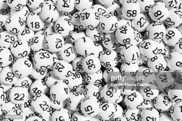 lottery balls filling the frame - lotteria fotografías e imágenes de stock