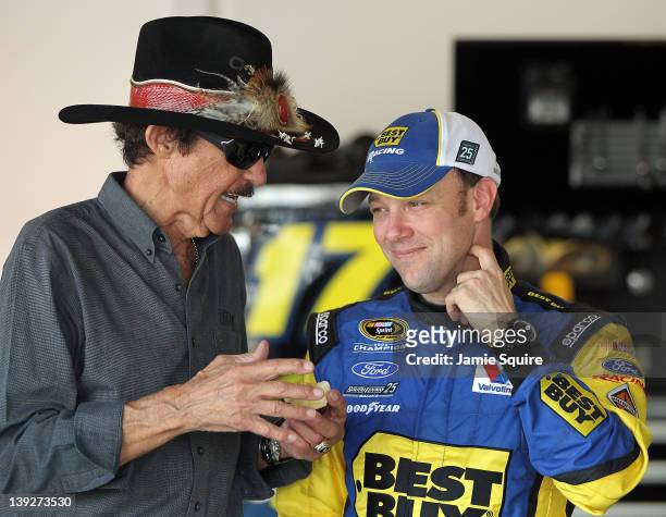 Team owner Richard Petty talks with Matt Kenseth, driver of the Best Buy Ford, in the garage during practice for the NASCAR Sprint Cup Series Daytona...