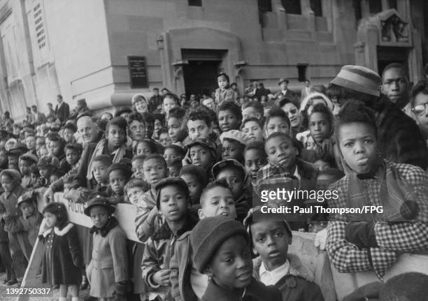 Section of the crowd, largely children, gathered to watch the Macy's Thanksgiving Day parade in the Manhattan borough of New York City, New York,...
