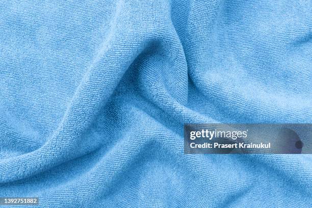 blue wrinkled towel background - textilien stock-fotos und bilder