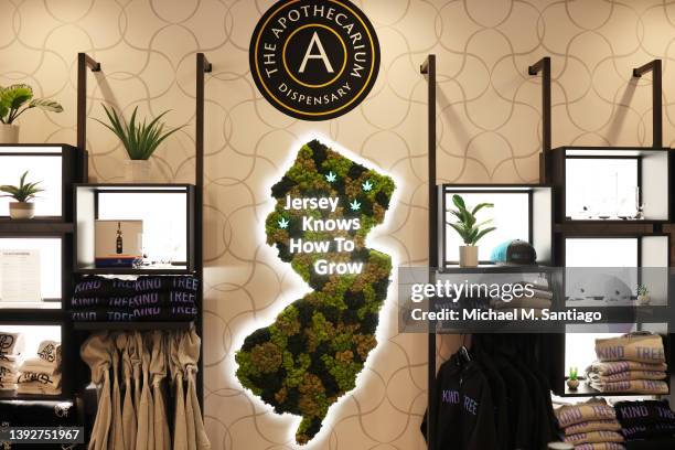 Marijuana products are displayed at Apothecarium Dispensary on April 21, 2022 in Maplewood, New Jersey. Today marked the first day of legal...