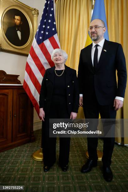 Treasury Secretary Janet Yellen and Ukraine Prime Minister Denys Shmyhal pose for photographs before a meeting at the Treasury Department on April...