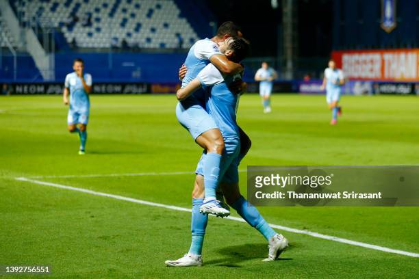 Carl Jenkinson of Melbourne City celebrates scoring his side's first goal with his team mate Andrew Nabbout during the AFC Champions League Group G...