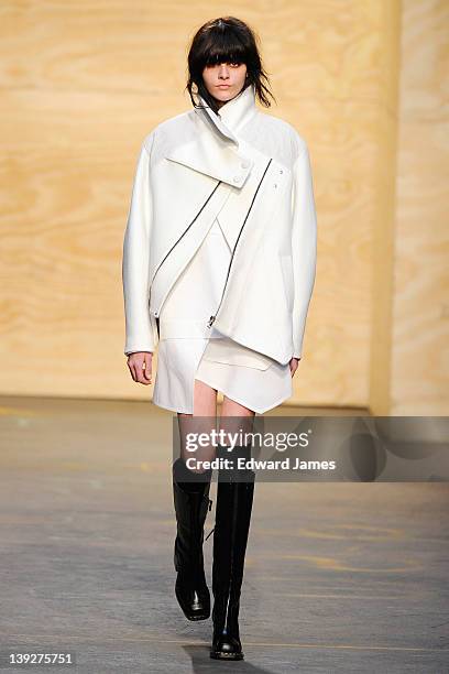 Model walks the runway at the Proenza Schouler Fall 2012 fashion show during Mercedes-Benz Fashion Week at on February 15, 2012 in New York City.