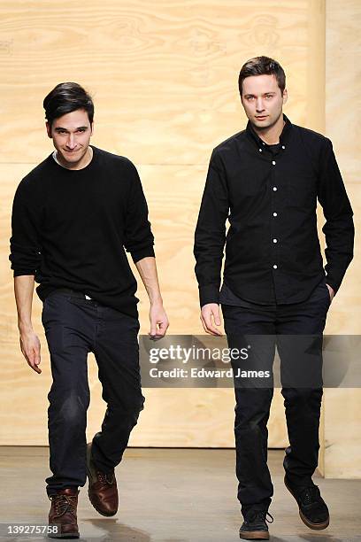 Designers Jack McCollough and Lazaro Hernandez walk the runway at the Proenza Schouler Fall 2012 fashion show during Mercedes-Benz Fashion Week at on...