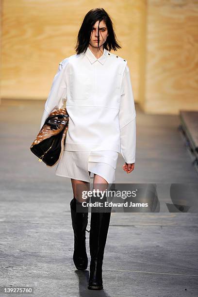 Model walks the runway at the Proenza Schouler Fall 2012 fashion show during Mercedes-Benz Fashion Week at on February 15, 2012 in New York City.