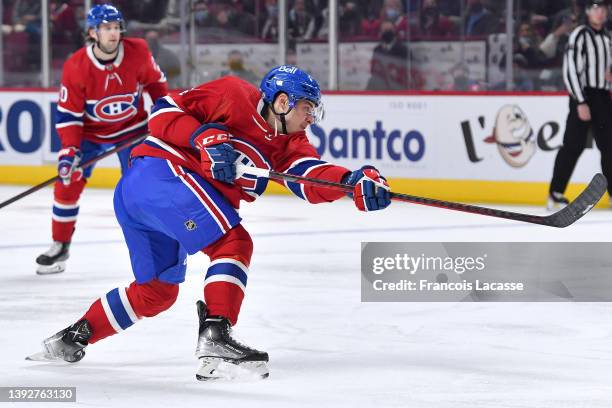 Corey Schueneman of the Montreal Canadiens passes the puck against the Washington Capitals in the NHL game at the Bell Centre on April 16, 2022 in...