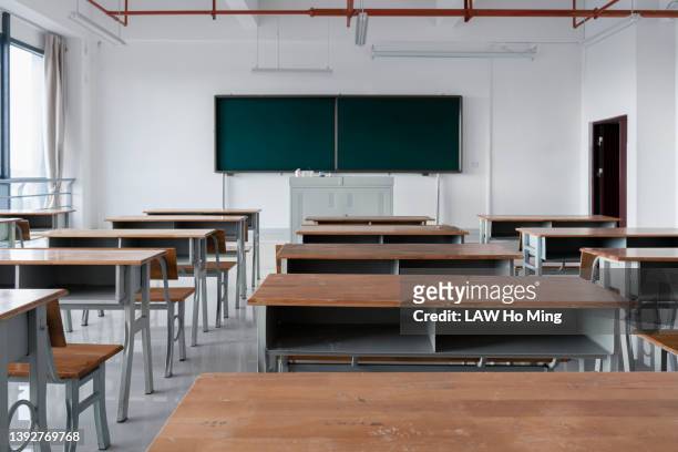 empty classrooms at school - brown v board of education stockfoto's en -beelden