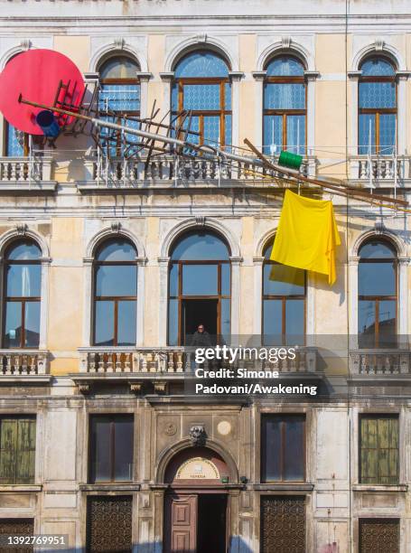 Inaugural Berggruen Arts & Culture Artist-in-Residence Sterling Ruby in front of HEX, the artist’s relief sculpture on the façade of Palazzo Diedo,...