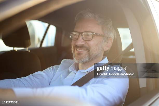 smiling driver - one mature man only stock pictures, royalty-free photos & images