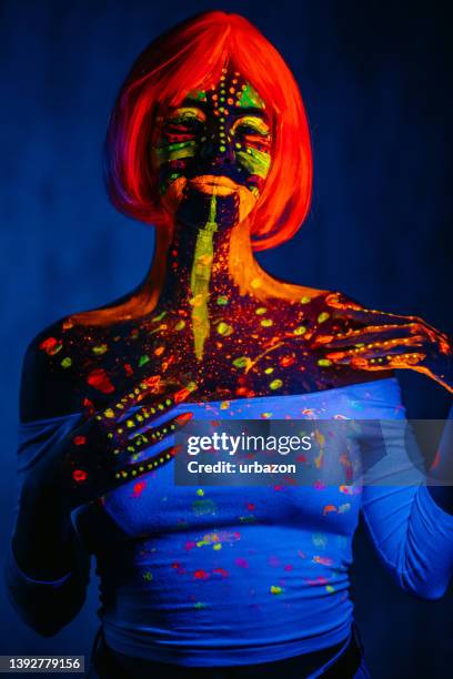 young woman with fluorescent makeup - neon fluorescent hair stock pictures, royalty-free photos & images