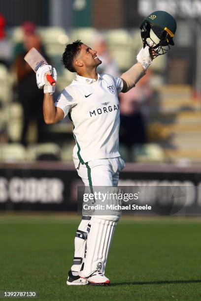 Brett D'Oliveira of Worcestershire celebrates reaching his century during day one of the LV= Insurance County Championship Division Two match between...