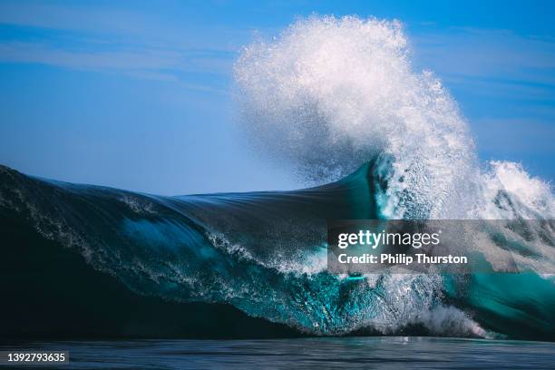 beautiful blue wave curling out at sea - passion abstract stock pictures, royalty-free photos & images