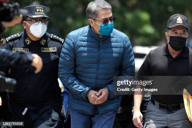 Former President of Honduras Juan Orlando Hernandez is escorted by Members of the Police Special Forces to be extradited to U.S.to face charges of...