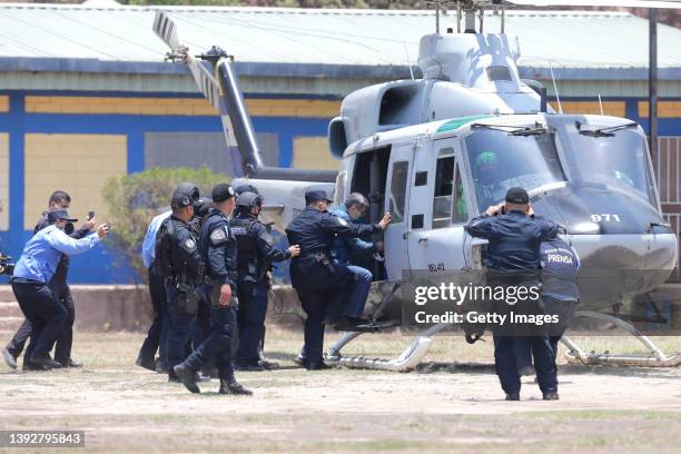 Former President of Honduras Juan Orlando Hernandez is escorted by Members of the Police Special Forces to be extradited to U.S.to face charges of...