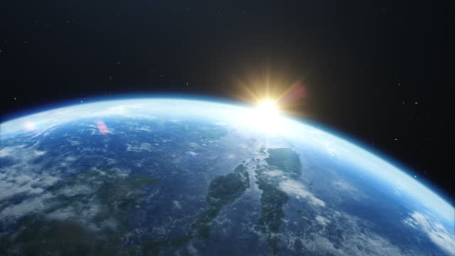 Rising Sun Illuminates Our Blue Planet's Clouds, Oceans and Peaceful Cities 4k stock video