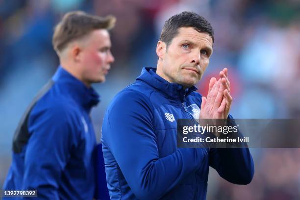 Michael Jackson, Caretaker Manager of Burnley applauds the fans prior to the Premier League match between Burnley and Southampton at Turf Moor on...