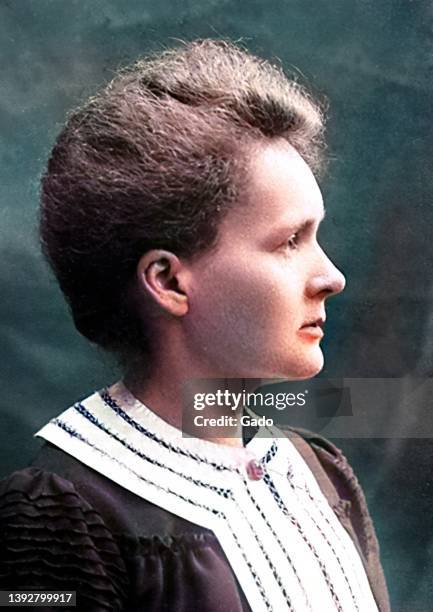 Head and shoulders portrait of scientist Marie Curie, 1903. Note: Image has been digitally colorized using a modern process. Colors may not be...