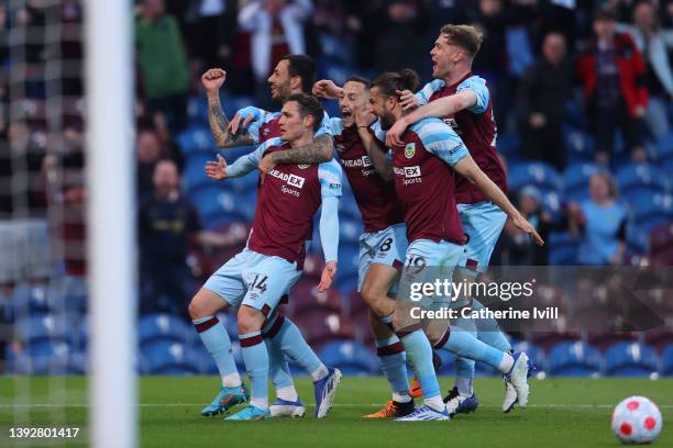 Connor Roberts of Burnley celebrates after scoring their side's first goal with team mates during the Premier League match between Burnley and...