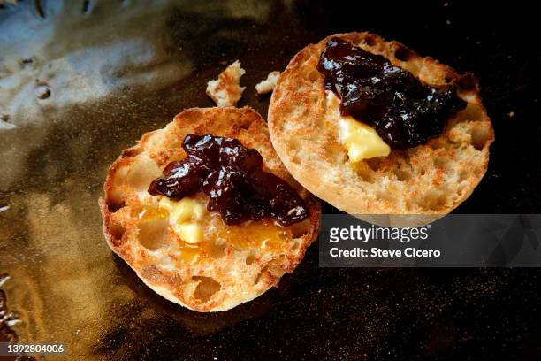 sliced english muffin on counter - english muffin stock pictures, royalty-free photos & images