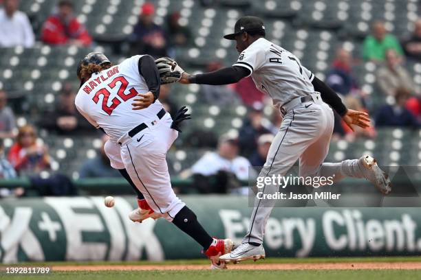 Josh Naylor of the Cleveland Guardians advances to third on a fielders choice ground ball after shortstop Tim Anderson of the Chicago White Sox...