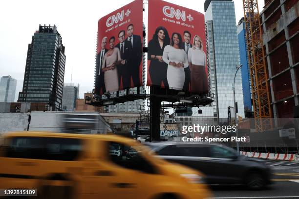 An advertisement for CNN+ is displayed in Manhattan on April 21, 2022 in New York City. Only three weeks after its launch, CNN has announced that...