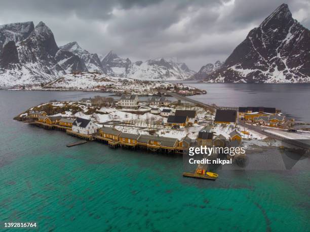 aerial view of sakrisoy village bay taken with a drone in winter - lofoten islands - norway - nordland county stock pictures, royalty-free photos & images