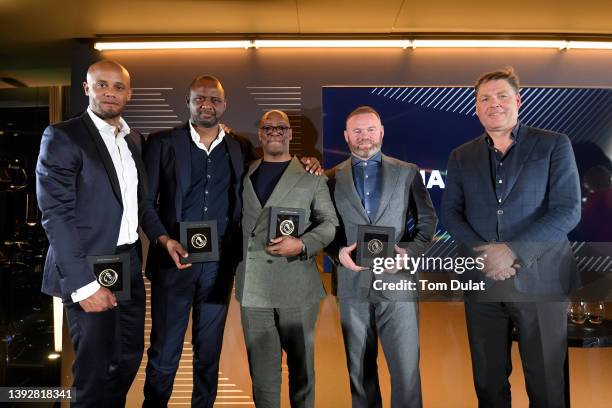 Vincent Kompany, Patrick Vieira, Ian Wright and Wayne Rooney pose alongside Premier League Chief Executive Richard Masters during the Premier League...