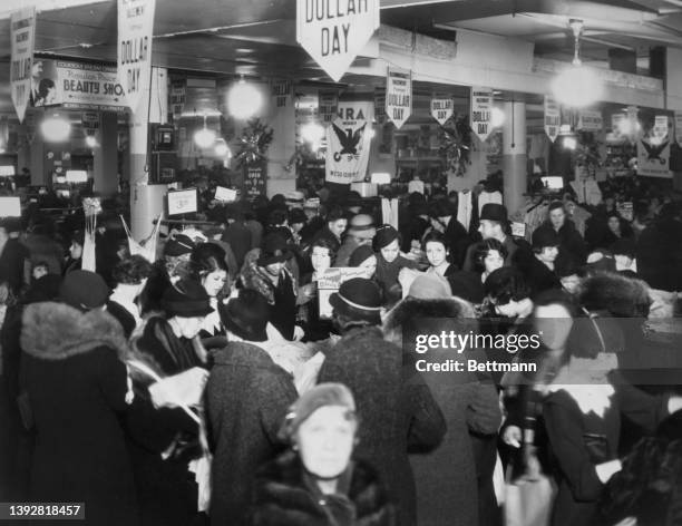 Crowded sale scene at Bloomingdale's department store.