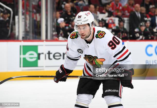 Tyler Johnson of the Chicago Blackhawks gets ready during a face off against the Arizona Coyotes at Gila River Arena on April 20, 2022 in Glendale,...