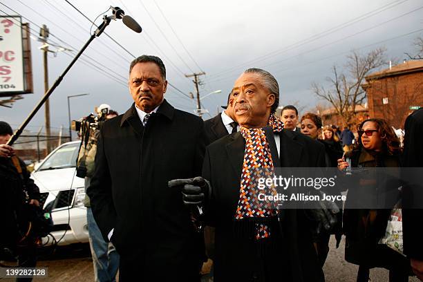 Rev. Jesse Jackson and Rev. Al Sharpton leave Whitney Houston's funeral at New Hope Baptist Church on February 18, 2012 in Newark, New Jersey....