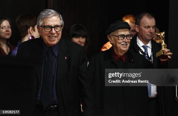 Italian directors Vittorio and Paolo Taviani pose after receiving the Golden Bear prize awarded for their film 'Caesar Must Die' at the Award Winners...