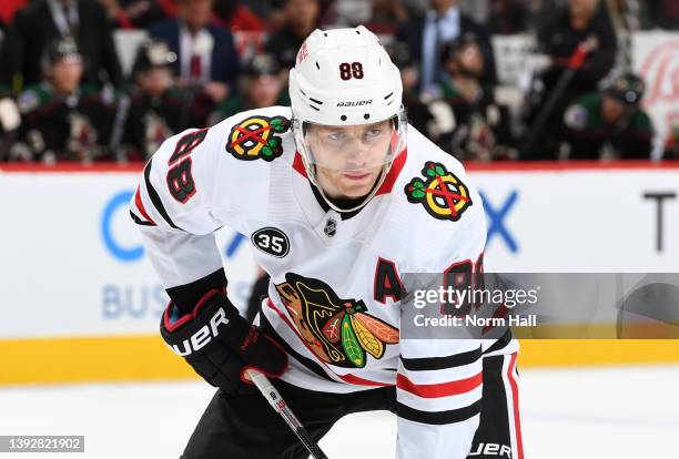 Patrick Kane of the Chicago Blackhawks gets ready during a face off against the Arizona Coyotes at Gila River Arena on April 20, 2022 in Glendale,...