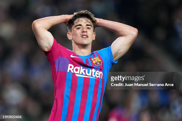 Gavi of FC Barcelona reacts during the LaLiga Santander match between Real Sociedad and FC Barcelona at Reale Arena on April 21, 2022 in San...