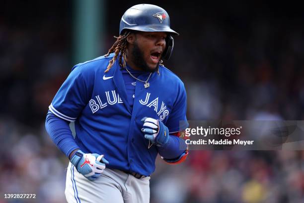 Vladimir Guerrero Jr. #27 of the Toronto Blue Jays reacts after fouling out during the seventh inning against the Boston Red Sox at Fenway Park on...