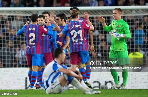 Players of FC Barcelona celebrate their side's victory after the LaLiga Santander match between Real Sociedad and FC Barcelona at Reale Arena on...