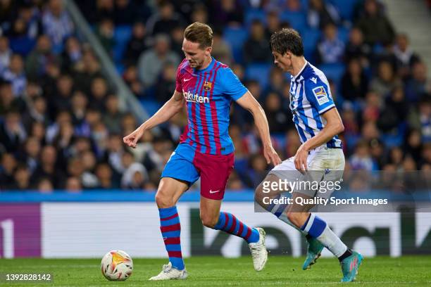 Robin Le Normand of Real Sociedad competes for the ball with Luuk de Jong of FC Barcelona during the LaLiga Santander match between Real Sociedad and...
