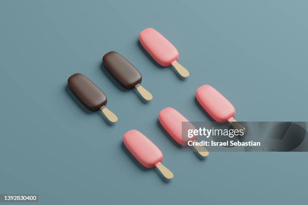 3d illustration. pattern of a delicious chocolate ice cream with stick on blue background. - eisbecher stock-fotos und bilder