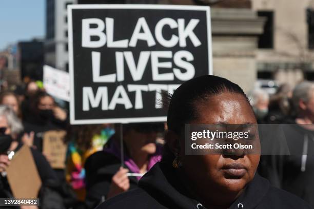 Dorcas Lyoya, the mother of Patrick Lyoya, listens to speakers during a rally in front of the Michigan state capital building where demonstrators...