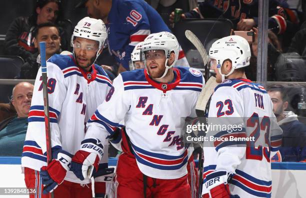 Andrew Copp of the New York Rangers celebrates his first period natural hattrick against the New York Islanders at the UBS Arena on April 21, 2022 in...