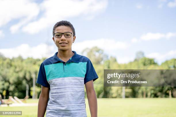 portrait of boy with glasses - 13 year old cute boys stock pictures, royalty-free photos & images