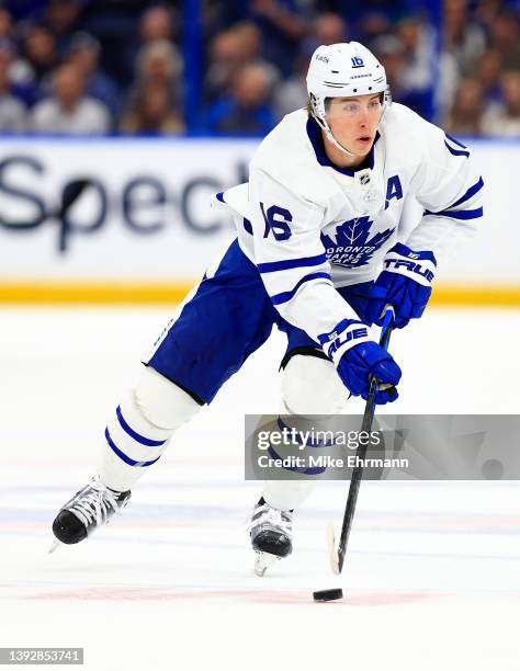 Mitchell Marner of the Toronto Maple Leafs looks to pass in the first period during a game against the Tampa Bay Lightning at Amalie Arena on April...